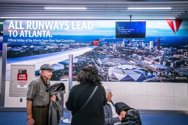 Delta passengers and signage in Atlanta