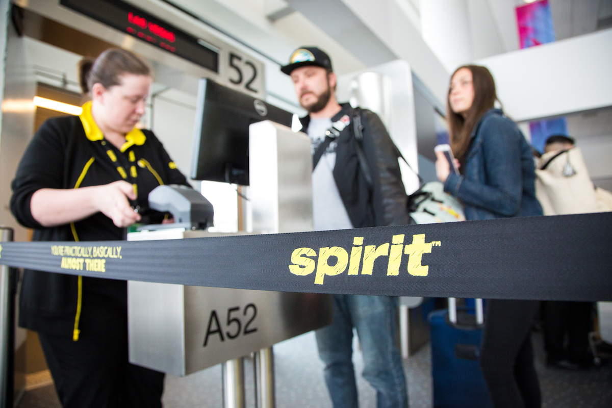 Passengers board a Spirit flight in Denver