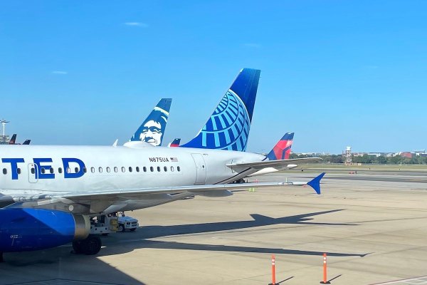 United, Delta, and Alaska tails at Washington Reagan National airport.