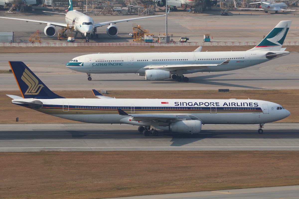 Cathay Pacific and Singapore Airlines planes at Hong Kong