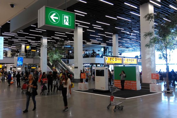 Travelers at Schiphol Airport