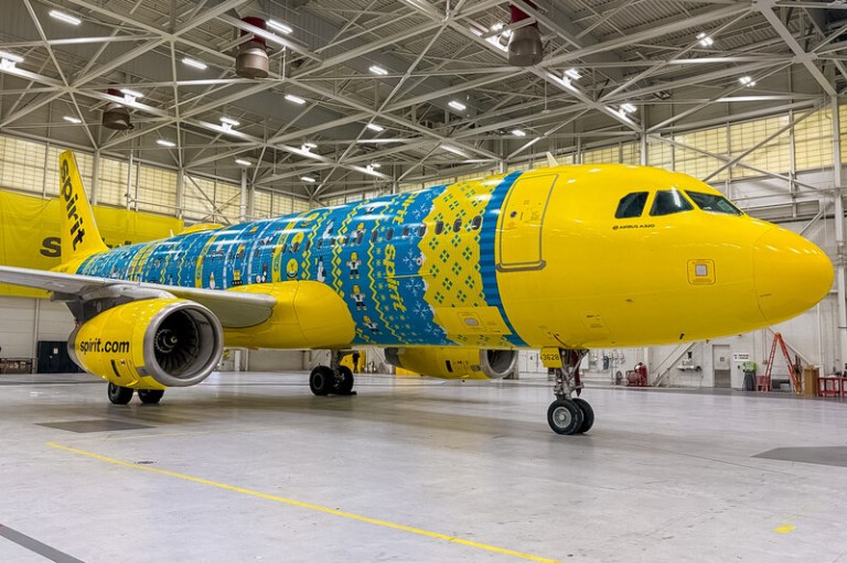 A Spirit Airlines A320 wearing a holiday livery.